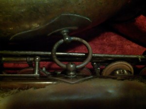 Distinctive ring that holds the bell of a Selmer Paris Saxophone to the main body of the horn.